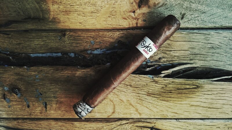 Cigar on Wooden Surface — Brown