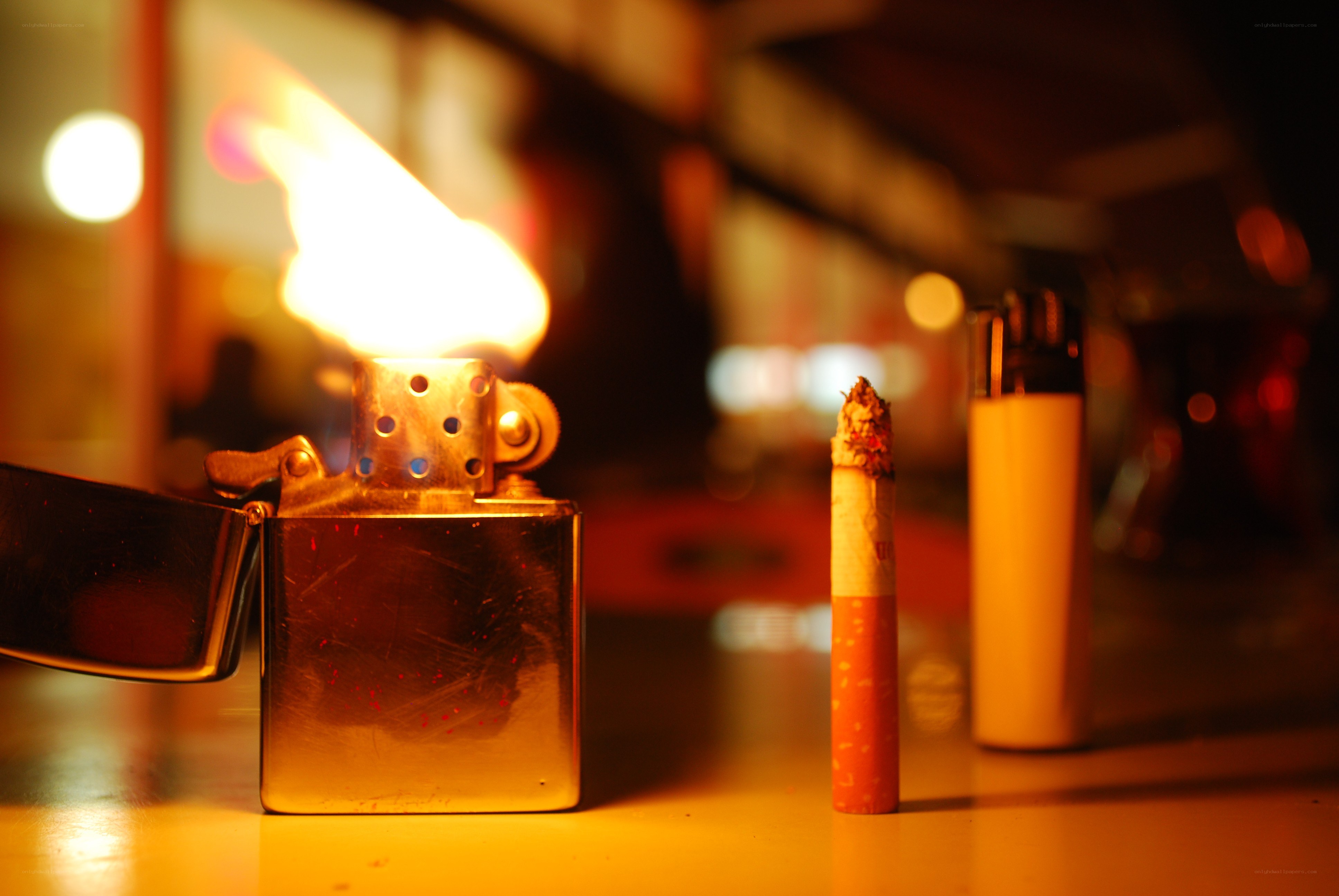 Cigarette and lighters on a table