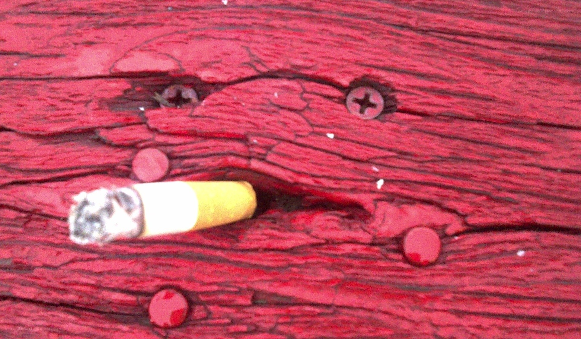 cigarette on red wood