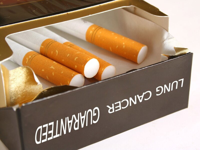 Cigarette pack with warning