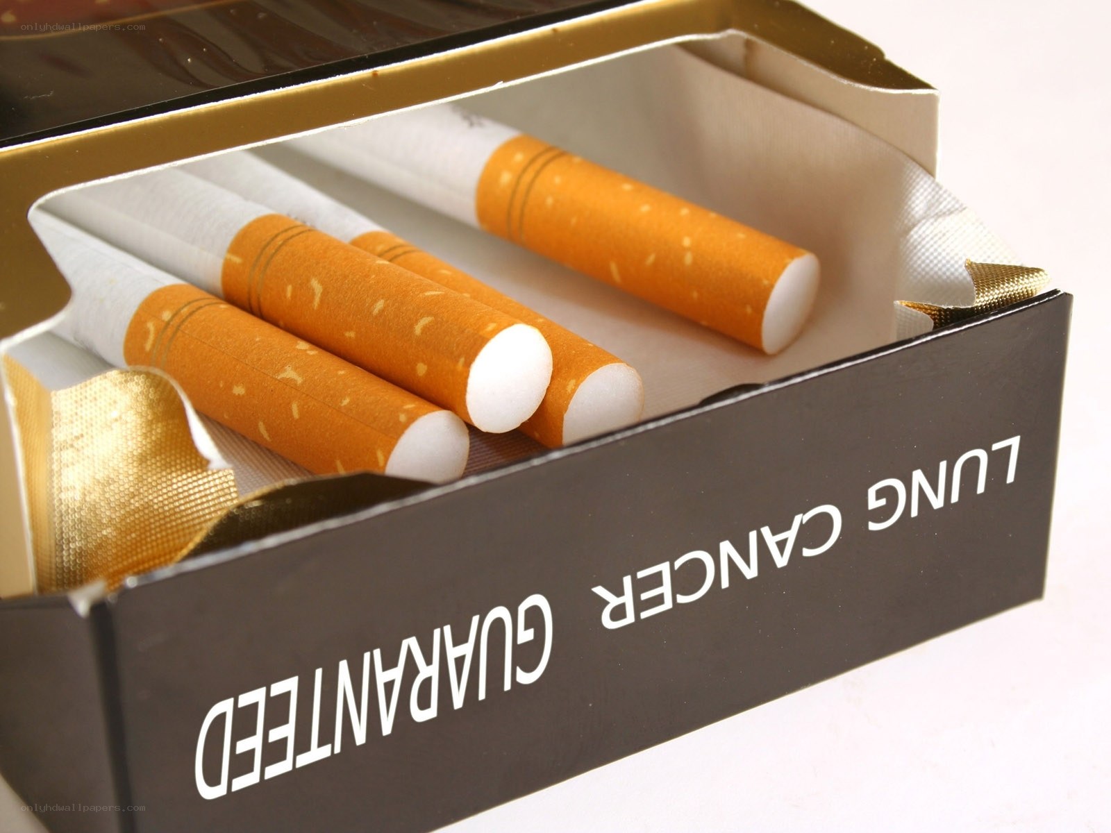 Cigarette pack with warning