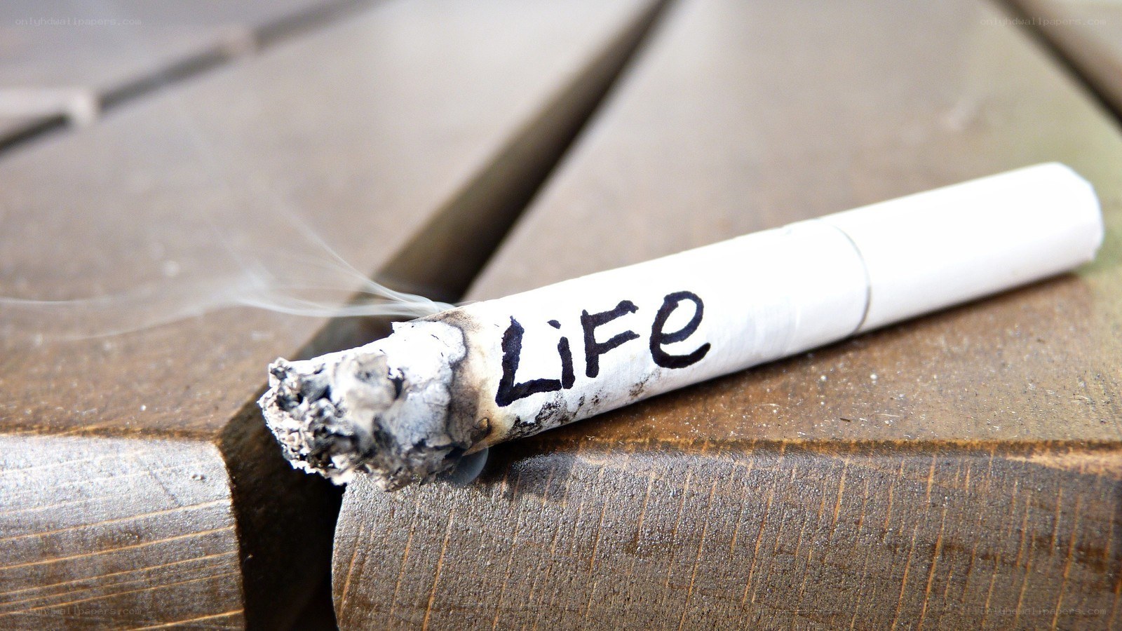 Cigarette with 'Life' written on it
