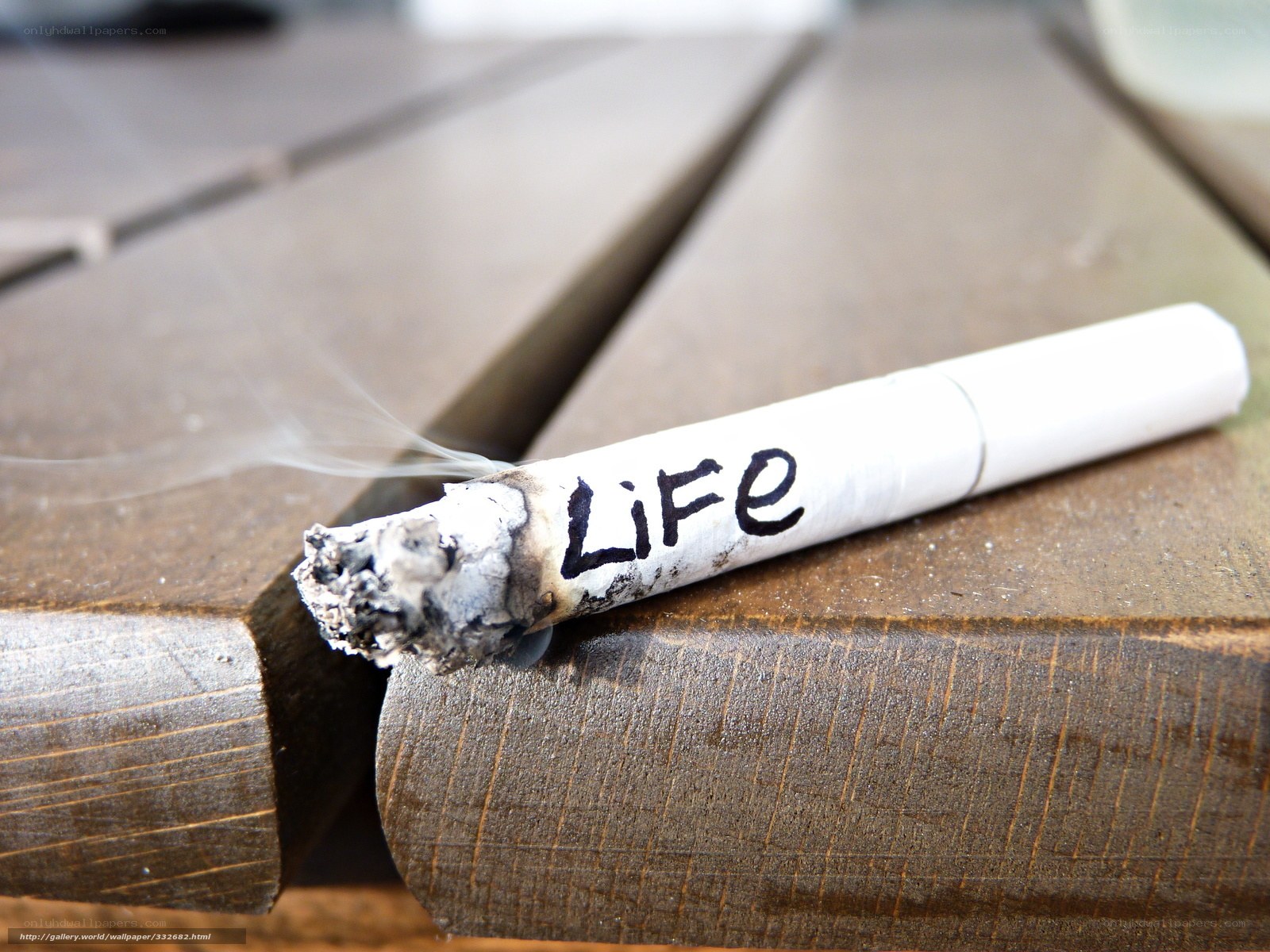 cigarette with life written on it