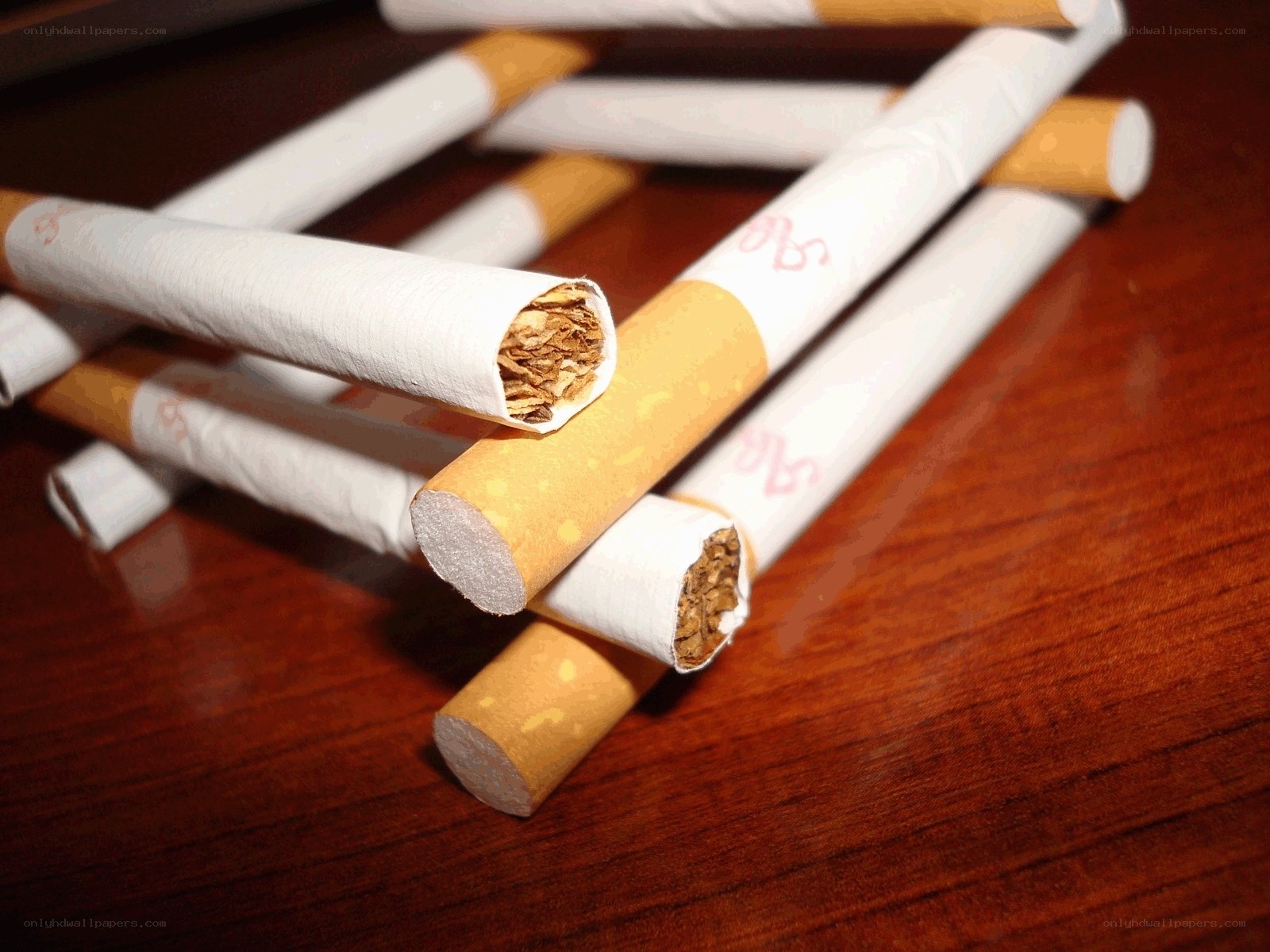 Cigarettes on wooden surface
