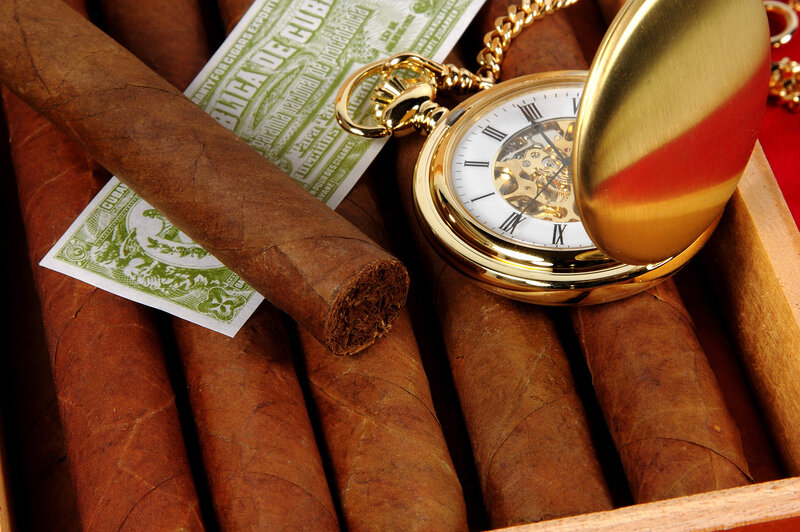 Cigars and pocket watch