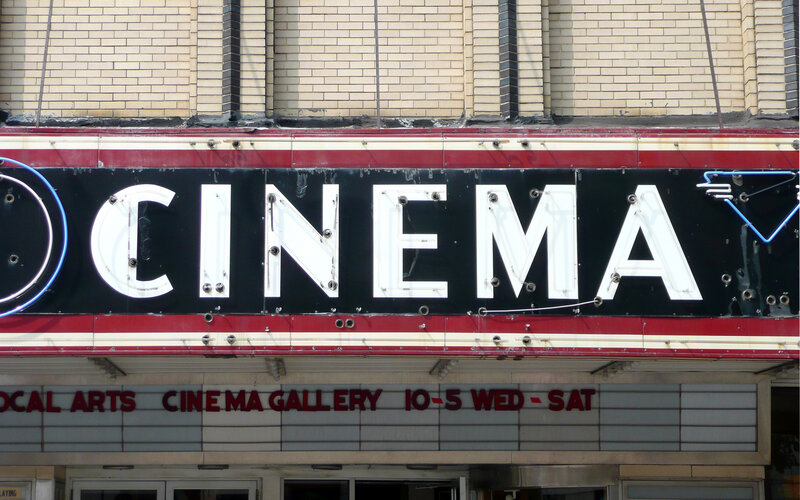 Cinema sign on brick building
