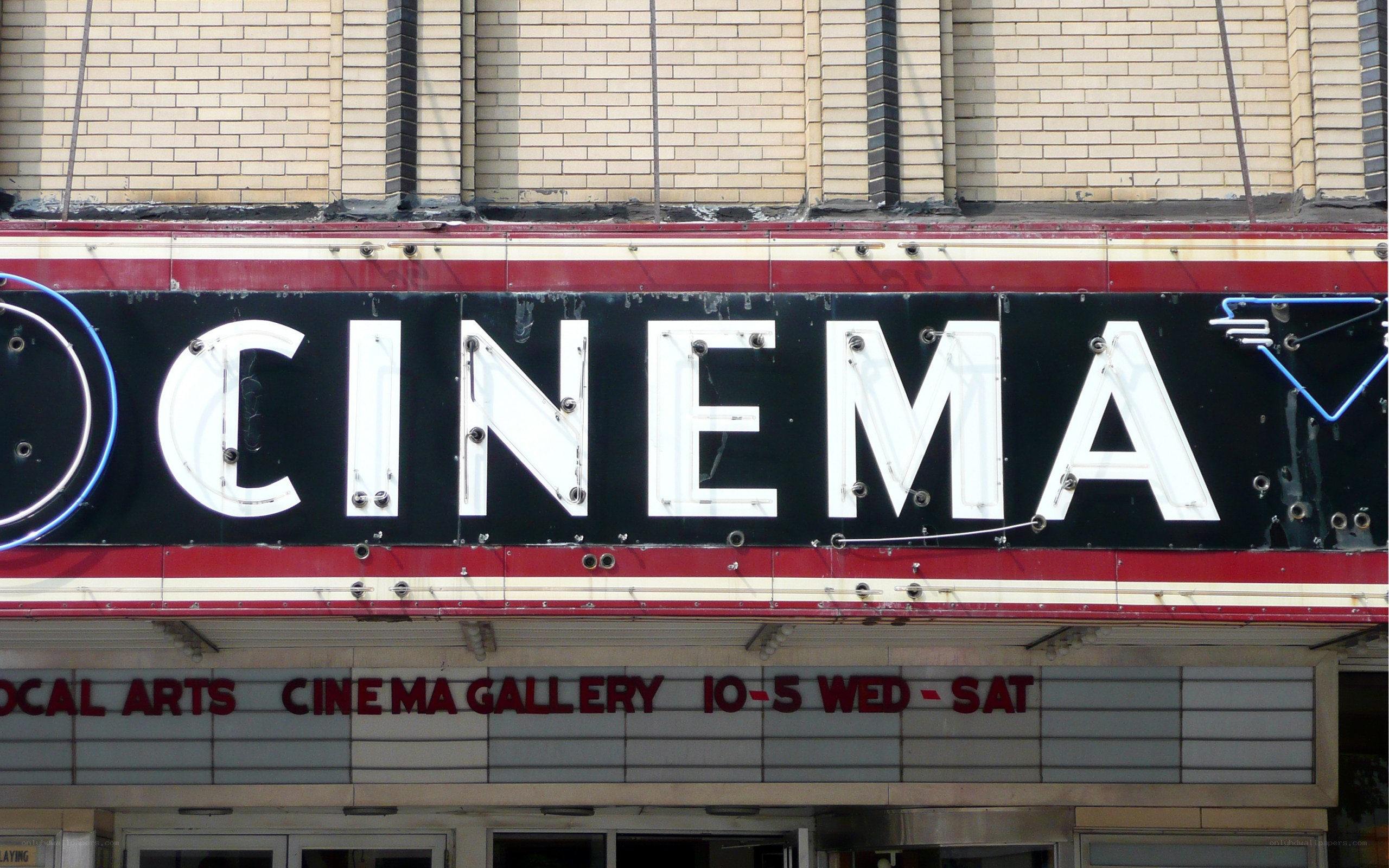 Cinema sign on brick building