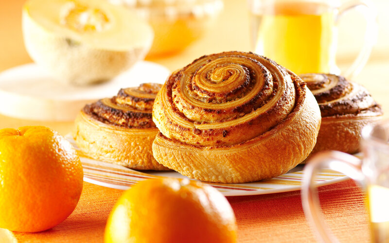 Cinnamon Rolls on Plate — Orange