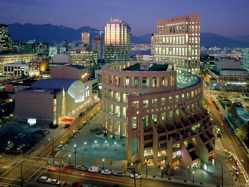 Circular Building at Night — Blue