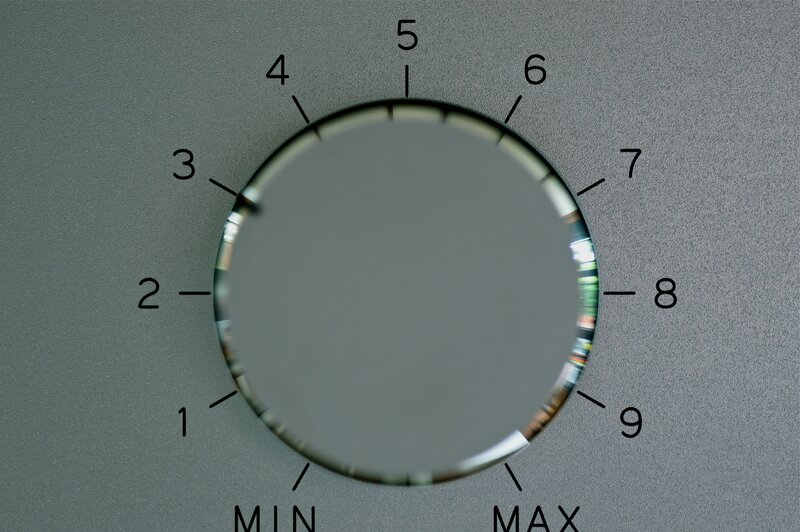 Circular Dial on Gray Surface
