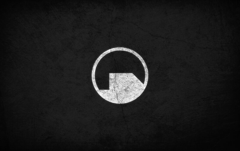 Circular Logo on Dark Background — Black
