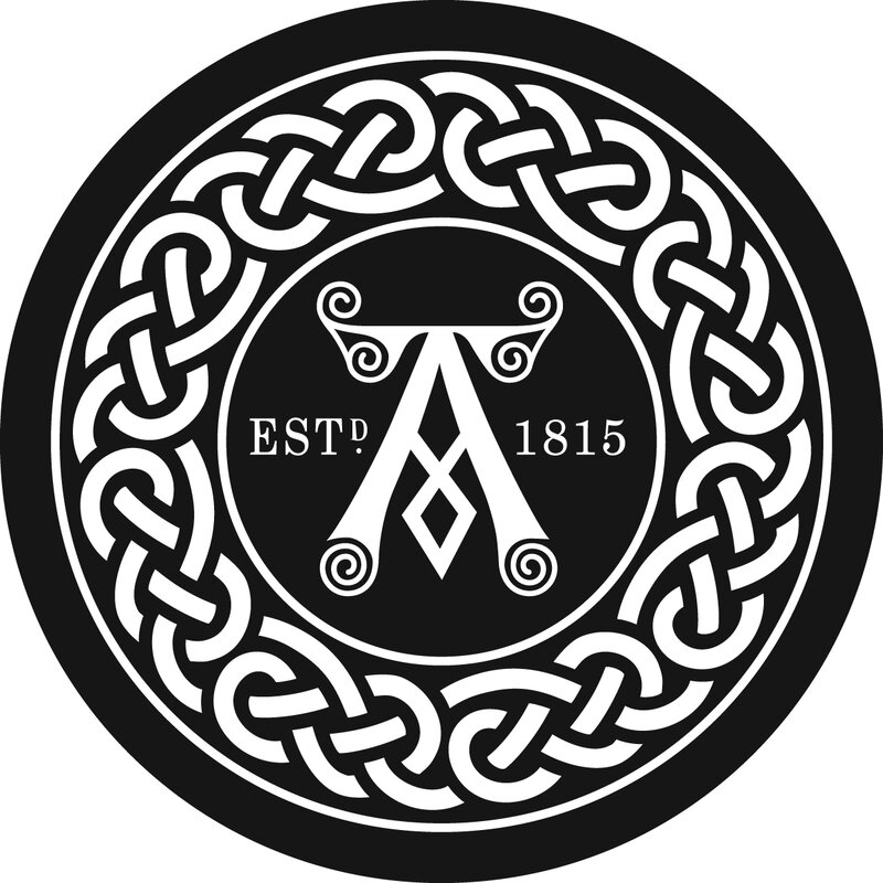 circular logo with celtic knot design