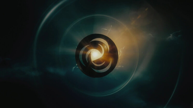 circular logo with light burst