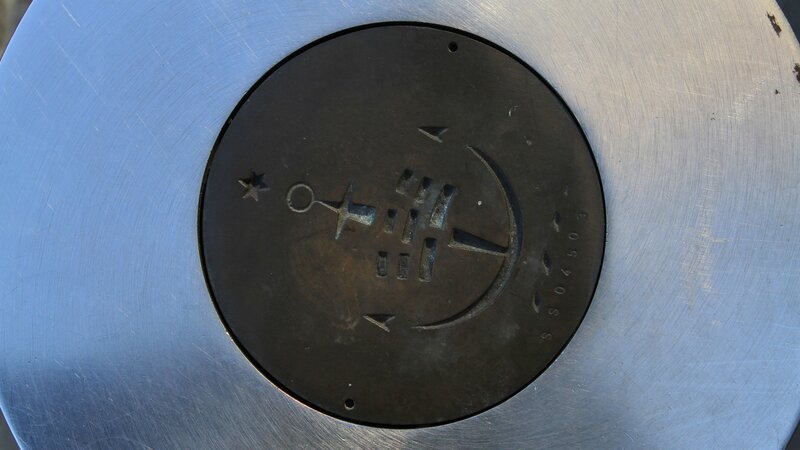 Circular Metal Plaque
