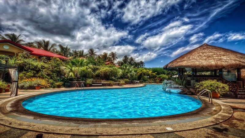 Circular Pool with Thatched Hut