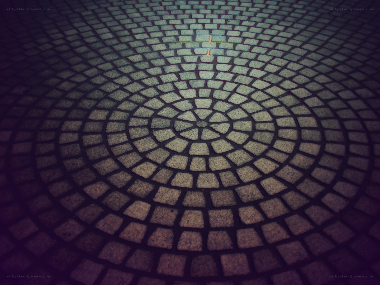 Circular stone pavement pattern