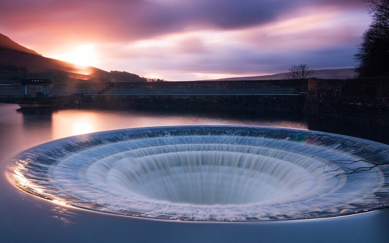 Circular waterfall at sunset