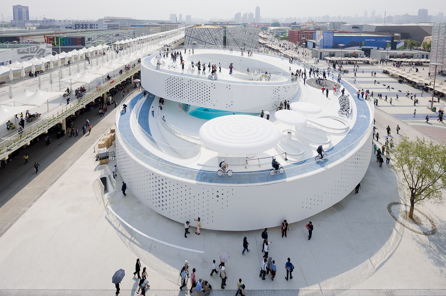 Circular white pavilion at an expo