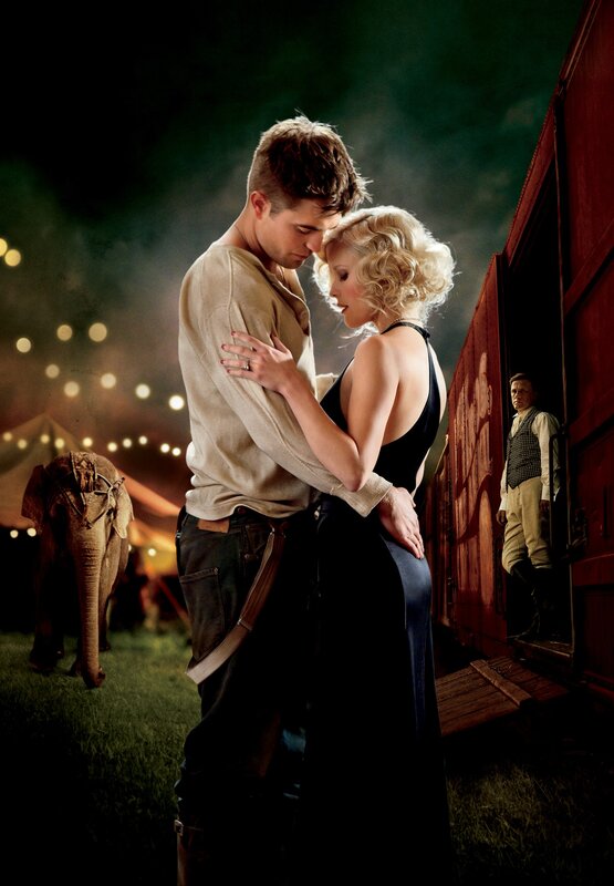 Circus couple embracing at night