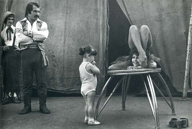 Circus performers and child