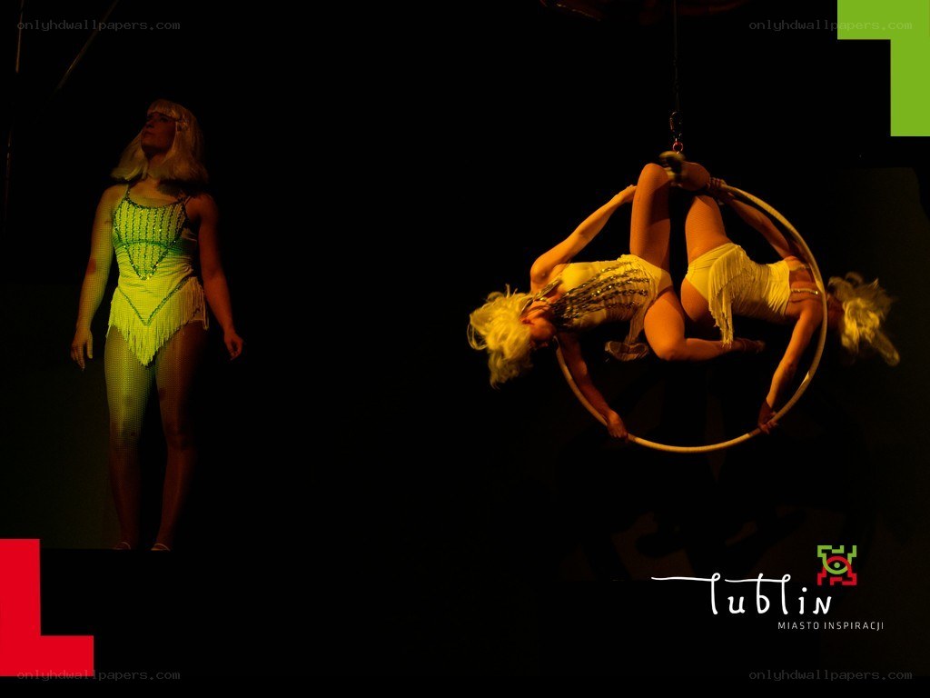 Circus performers on aerial hoop