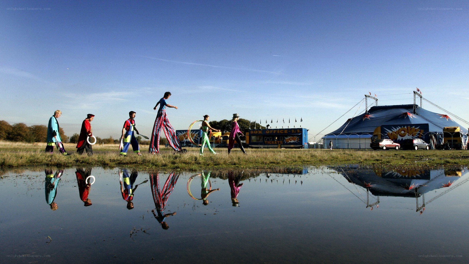 Circus performers on stilts
