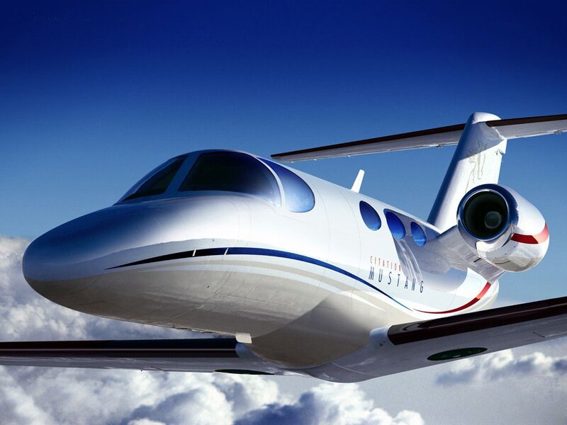 Citation Mustang private jet in flight