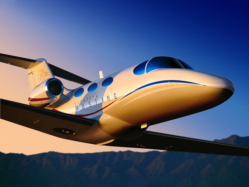 Citation Mustang private jet in flight