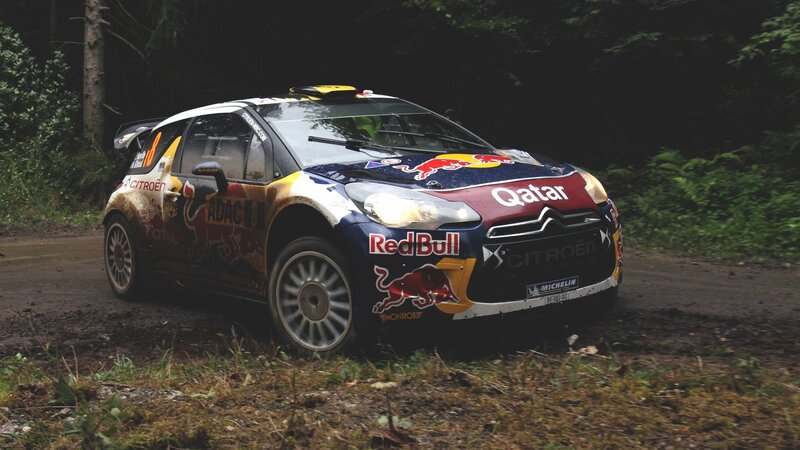 Citroën rally car on forest road