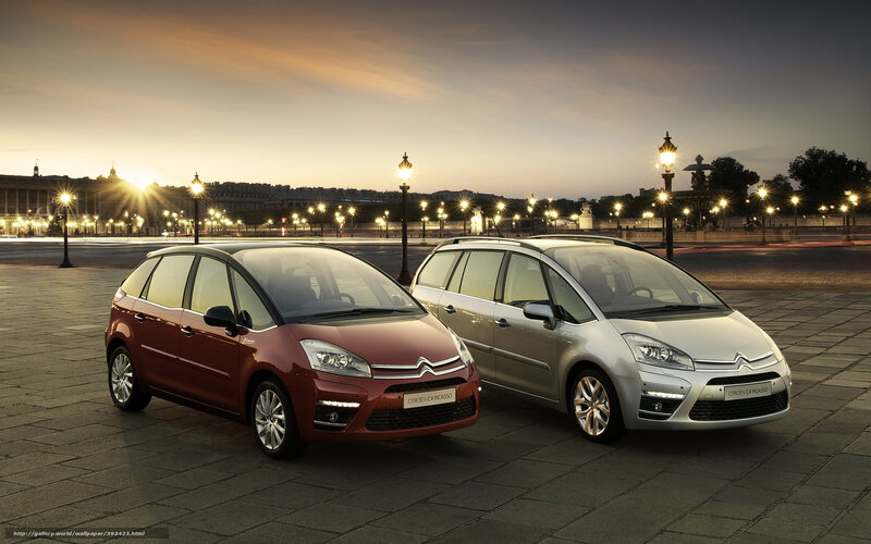 Citroen C4 Picasso cars at dusk