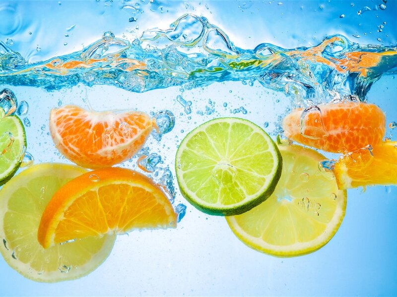 Citrus Fruit Slices in Water — Blue