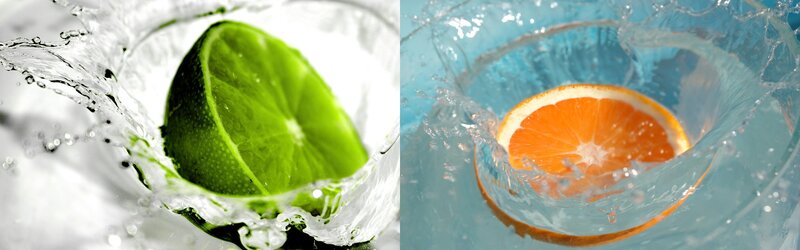 citrus fruit splashing in water