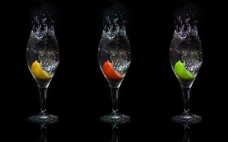 Citrus splash in wine glasses
