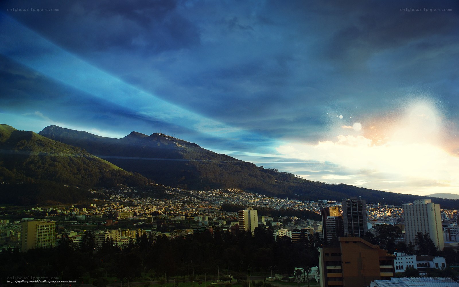 City at dusk with mountain view