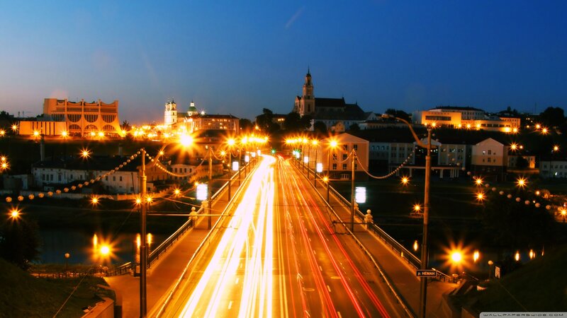 City bridge at night with light trails