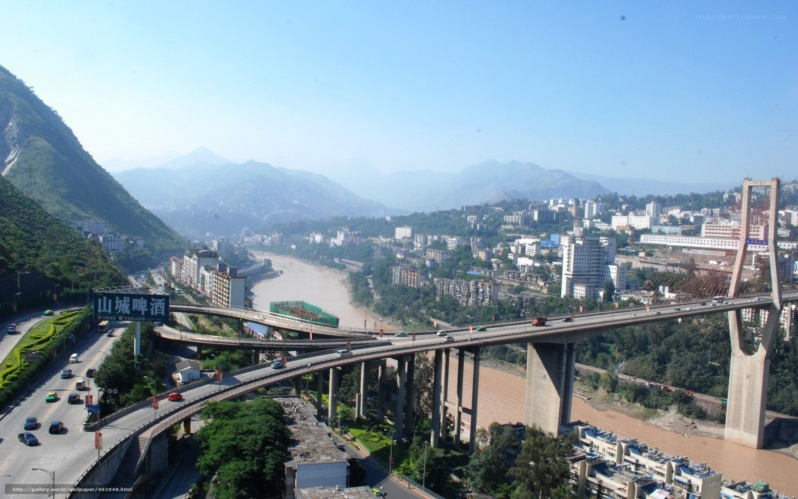 City bridge over river in mountains