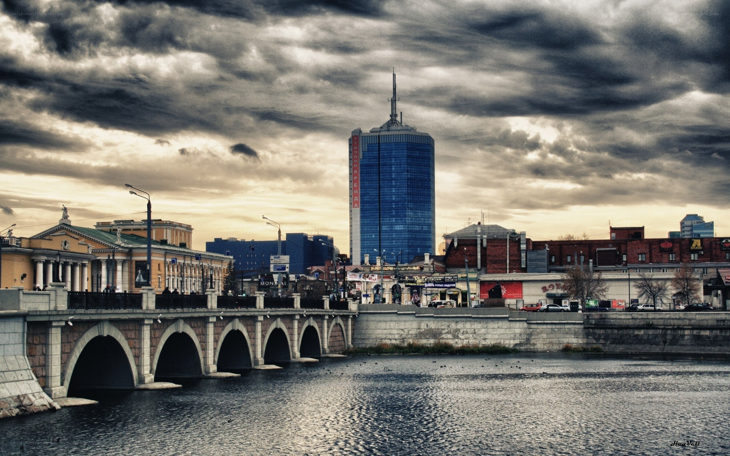 City bridge under cloudy sky