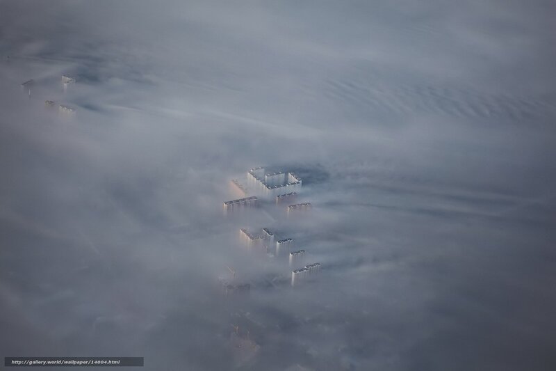 City buildings in fog