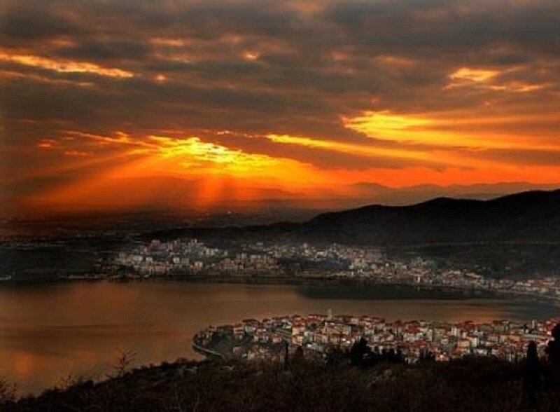 City by Lake at Sunset