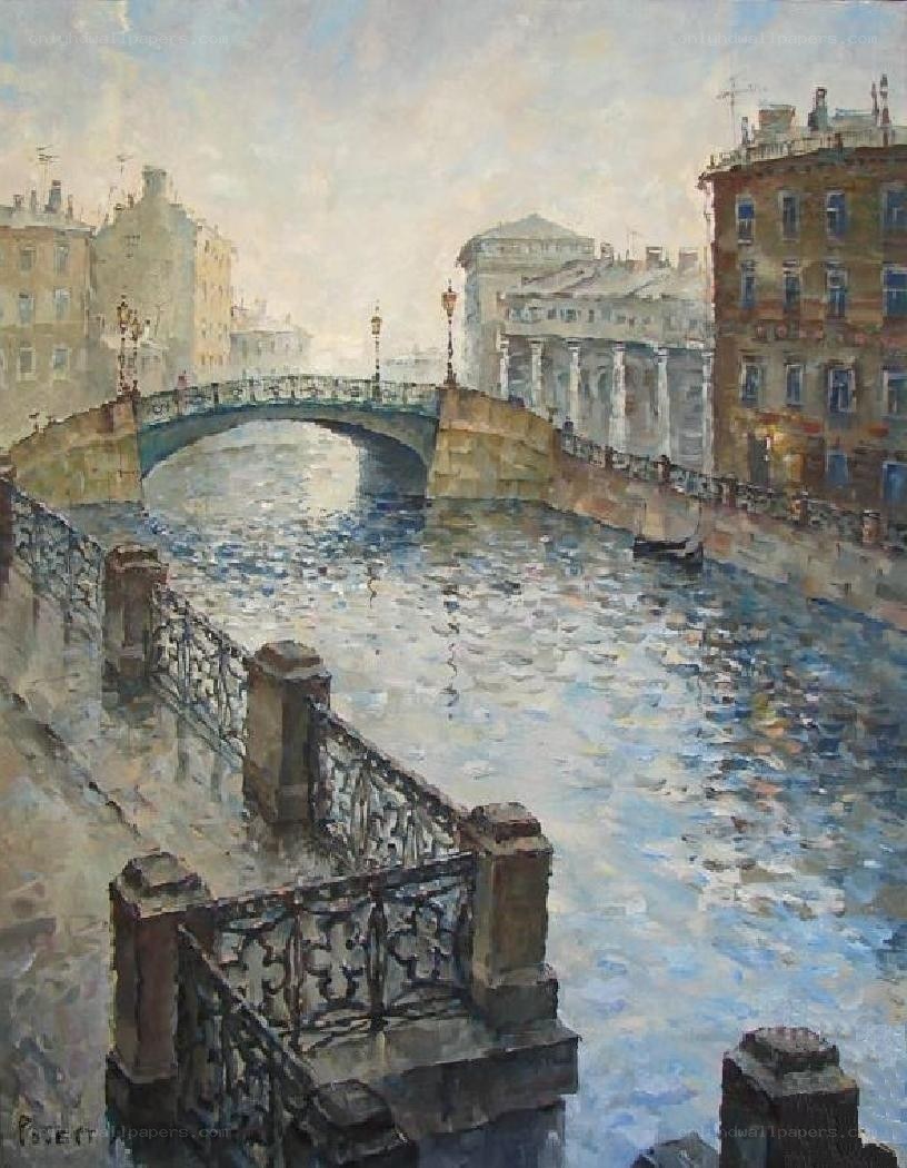 City canal with arched bridge