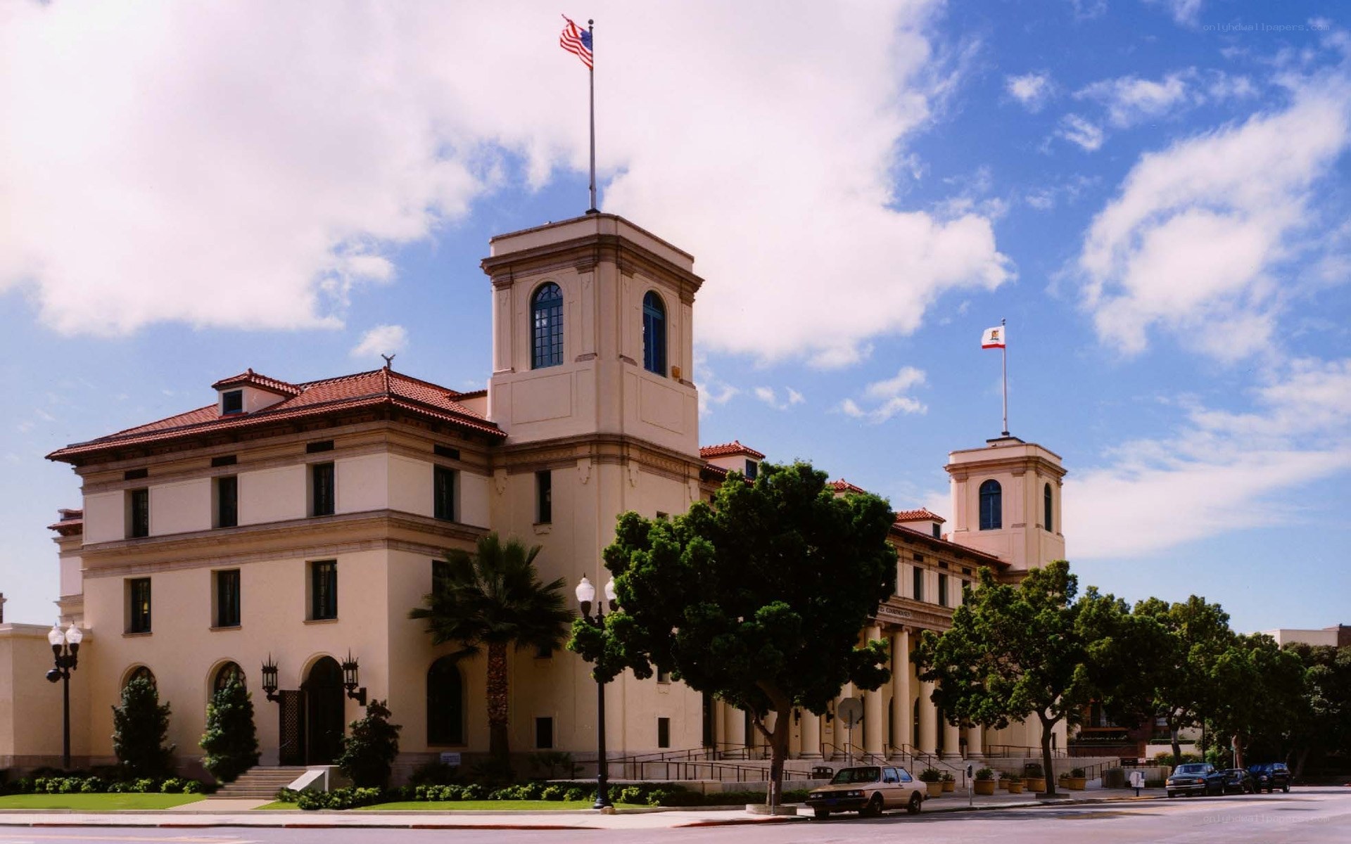 City hall building with flags