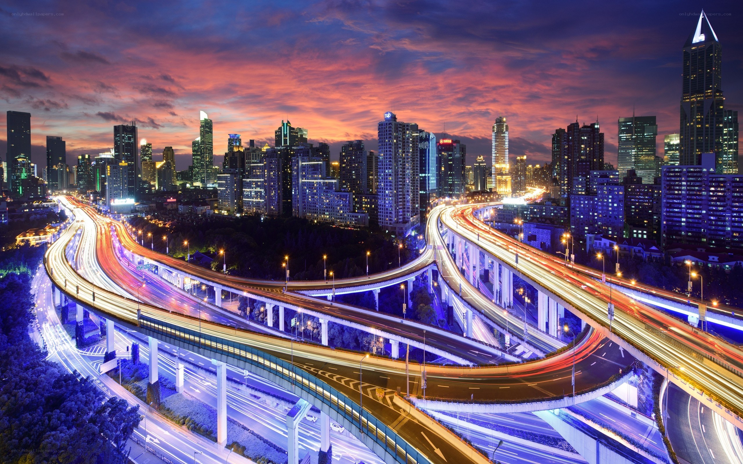 City highway interchange at dusk