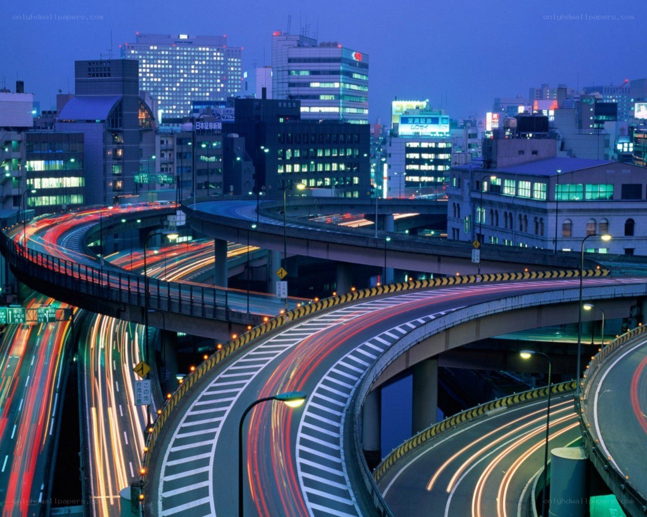 City highway interchange at dusk