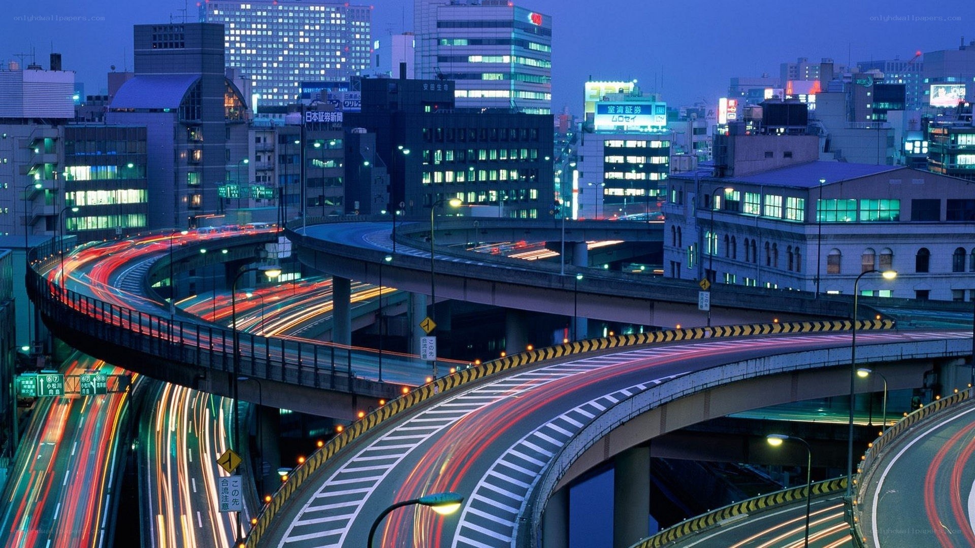 City highway interchange at dusk