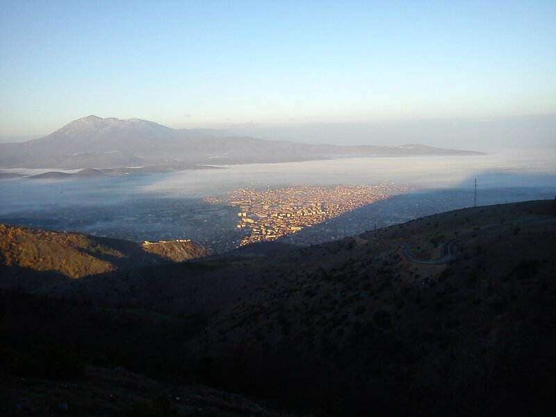 City in Valley at Sunrise