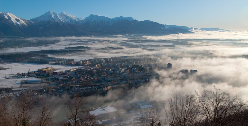 City in Valley with Mountains