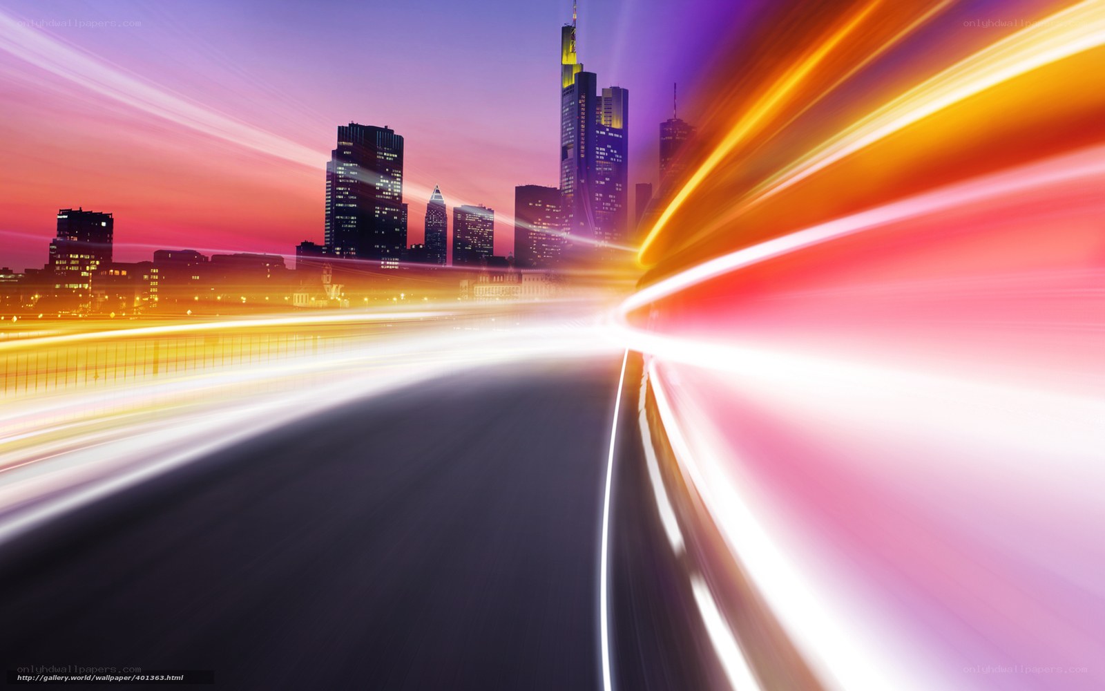 City lights at dusk with light trails