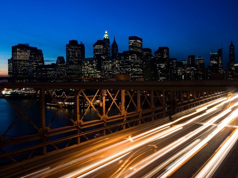 City lights at night from a bridge