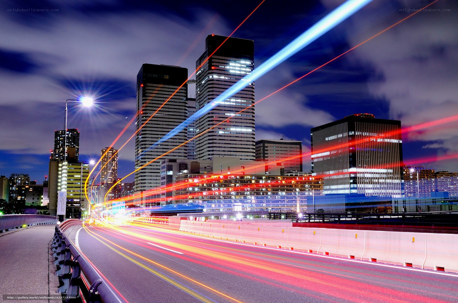 City lights at night with light trails