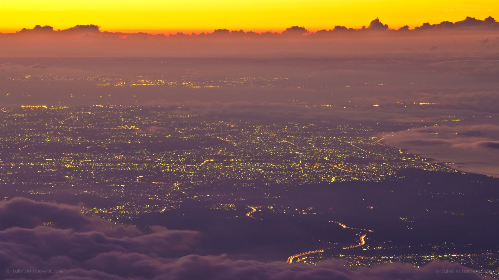 city lights at sunset from above